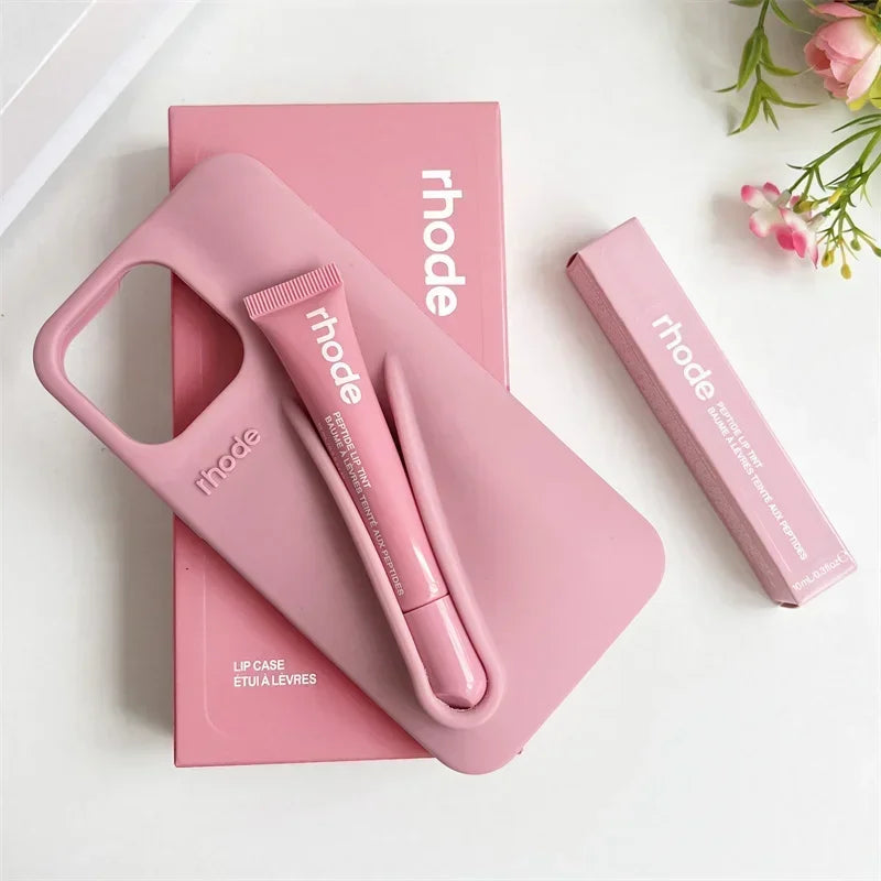 Rhode Pink lip care products with 'rhode' branding on a white background