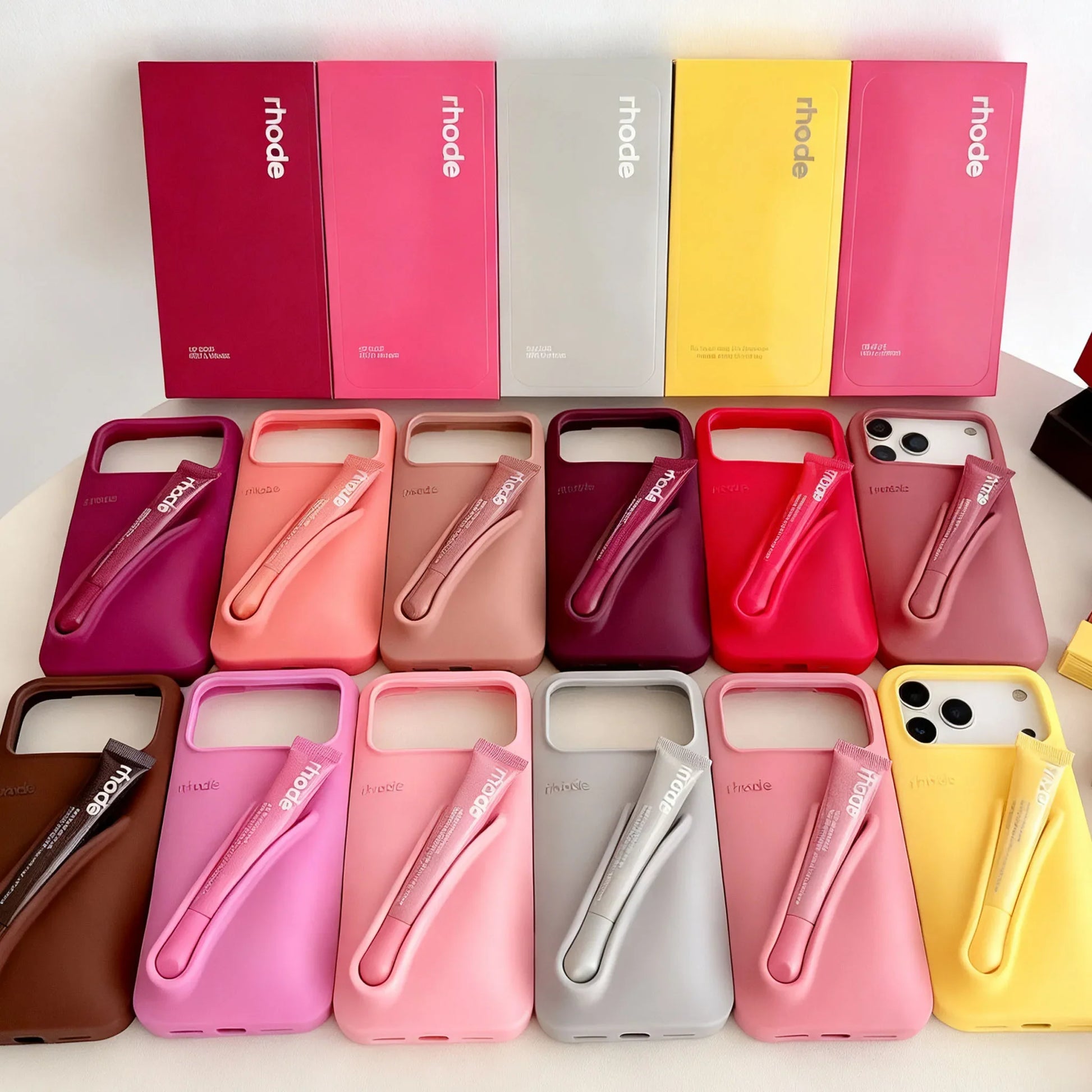 Collection Rhode of phone cases in various colors with 'rhode' branding.