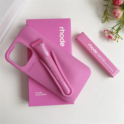 Pink lip care product with 'rhode' branding on a white background