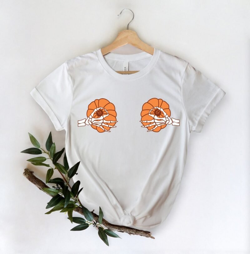 Halloween style with our 'Jack The Skeleton Pumpkin Shirt.' A funny and fashionable Women's Skeleton Shirt for spooky yet playful vibes.